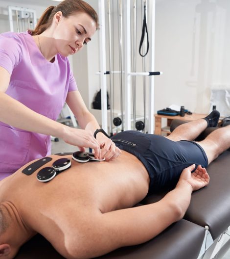 man-having-myostimulation-physiotherapy-procedure-2023-11-27-05-15-52-utc-min